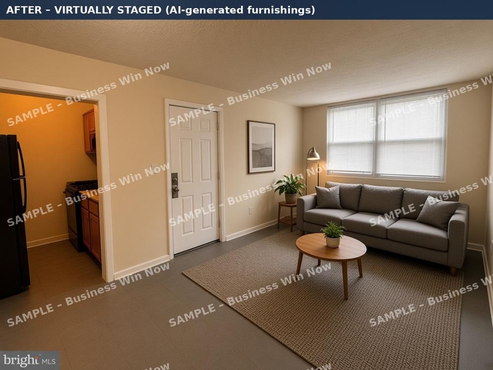 Same living room after virtual staging with a sofa, rug, coffee table and plants